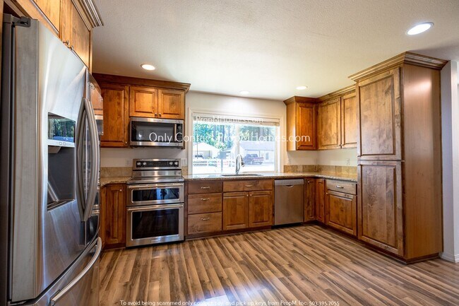 Building Photo - Light-Filled, Recently Updated Three Bedro...