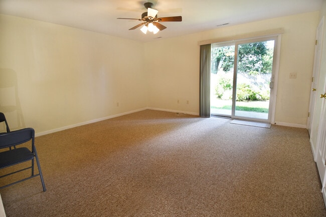 Living room with sliders to patio - 135 Tobin Dr