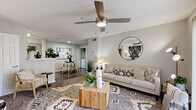 Located at 1500 Brandon Glen Way NE in Conyers, GA, this 1-bedroom, 1-bathroom residence offers a thoughtfully designed single-floor layout that maximizes functionality and comfort. The living room serves as the heart of the home, featuring a ceiling fan with light fixture, hardwood-style flooring, and a sliding glass door that fills the space with natural light and provides access to the outdoors. The galley-style kitchen is outfitted with gray shaker cabinetry, marble-look countertops, a subway tile backsplash, and stainless steel appliances, including a refrigerator, range, and dishwasher. Adjacent to the kitchen, the dining area offers a cozy space for meals and includes an in-unit washer and dryer conveniently tucked nearby. The bedroom features plush carpet, a ceiling fan, a window with outdoor views, and a spacious closet. The bathroom is finished with gray vanity cabinetry, a marble-look countertop, a well-lit mirror, and hardwood-style flooring. A welcoming entryway with a smart thermostat completes the layout, tying together a space that balances modern finishes with practical living in a neutral, cohesive palette throughout.