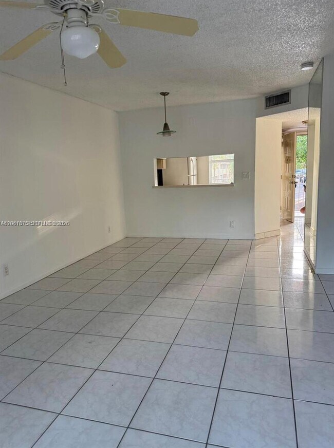 Building Photo - 8750 Royal Palm Blvd