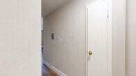Located at 1560 N Prospect Ave in Milwaukee's desirable East Side neighborhood, this one-bedroom, one-bathroom unit offers a well-designed and efficient layout across a single floor. The space is thoughtfully organized with a hallway connecting the main living areas.

The bedroom is a comfortable, well-proportioned room featuring soft carpeting, neutral beige walls, a ceiling fan with light fixture, a natural-light-admitting window with blinds, a baseboard heating unit, and a closet — providing practical functionality and a calm atmosphere.

The kitchen stands out as a highlight of the unit, featuring crisp white shaker-style cabinetry, granite-look countertops, a stainless steel sink, and a full suite of stainless steel appliances including a range, over-the-range microwave, and dishwasher. Light hardwood-style flooring and a bright window enhance the clean, modern aesthetic.

The bathroom is brightened by a window offering views of the surrounding neighborhood, complemented by a full bathtub with a shower curtain and clean white finishes throughout.

Consistent neutral tones, hardwood-style flooring in main areas, and carpet in the bedroom create a cohesive and move-in-ready environment. This unit offers a practical and comfortable living experience in a prime Milwaukee location.