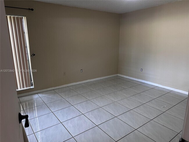Building Photo - 8810 SW 123rd Ct