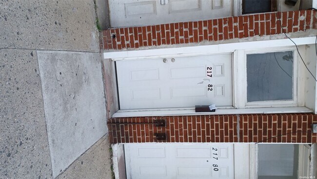 Building Photo - 217-82 Hempstead Ave