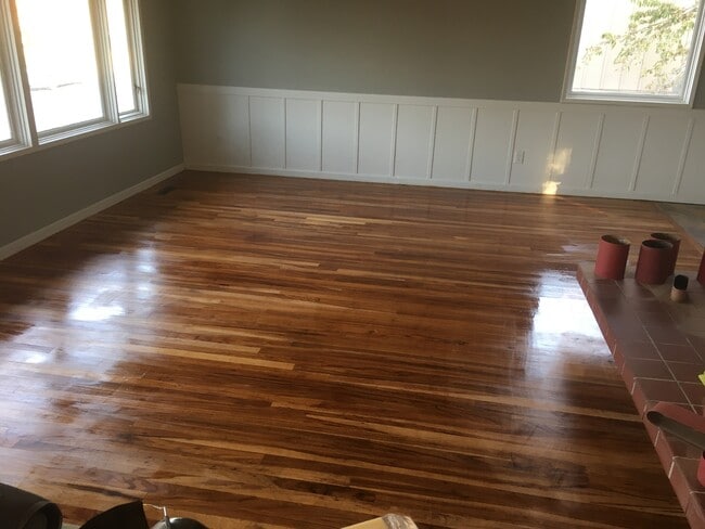 Upstairs Living Room floors Done - 3512 East Ben Burr Boulevard