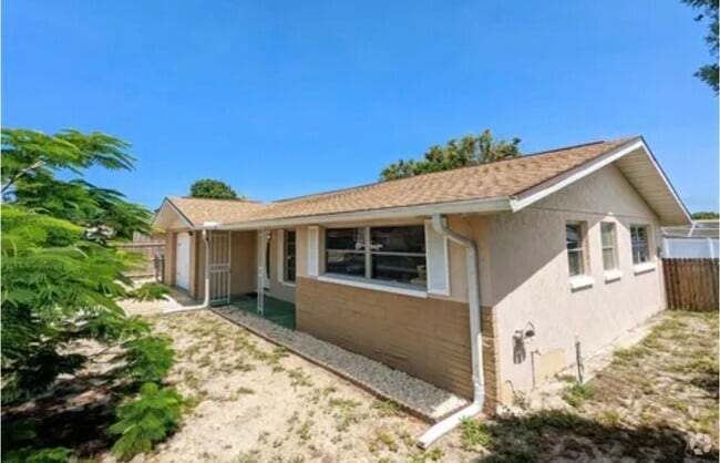 Building Photo - 8019 Portage Dr