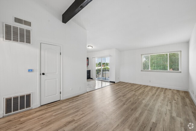 3BR, 2BA - 1,200SF - Living Room - Town and Country