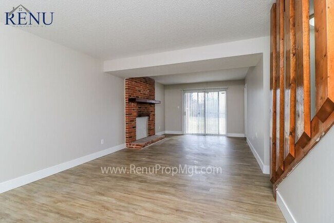 Building Photo - Spring into savings with 50% off your firs...
