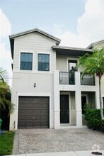 Building Photo - 6055 NW 104th Ct