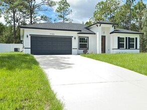 Building Photo - 7130 N Glenridge Cir