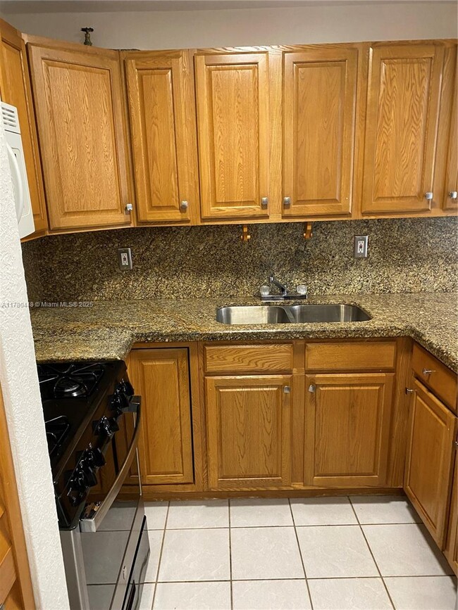 Building Photo - 1300 W 47th Pl
