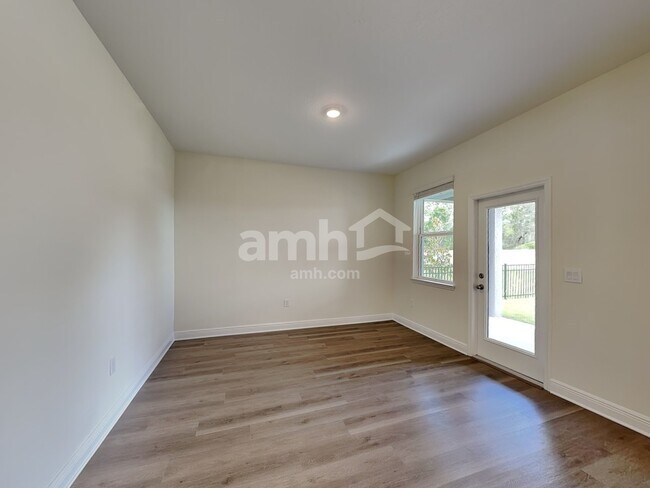 Building Photo - 5955 Pinewood Ests Dr