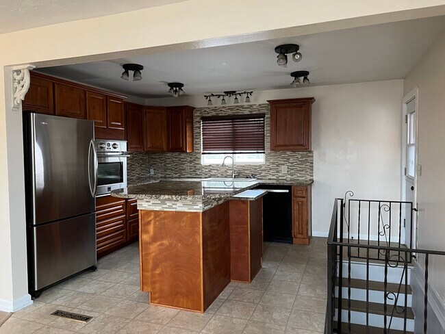Kitchen - 8911 E Upriver Dr