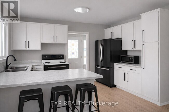 Photo du bâtiment - 23 Homewood Ave