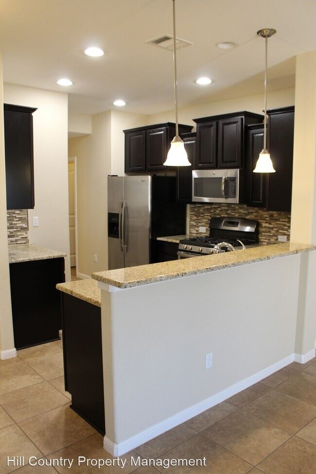 Building Photo - 4 br, 2 bath House - 409 Tula Trail
