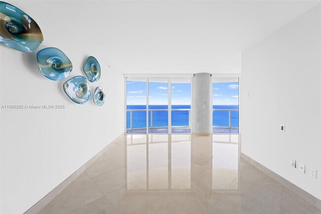 Building Photo - 6365 Collins Ave