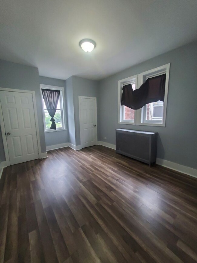 Building Photo - Newly Rehabbed 4 Bedroom with Open Patio S...