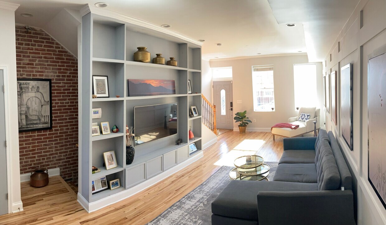 Living, entertaining area flooded with natural light - 313 Elm St NW
