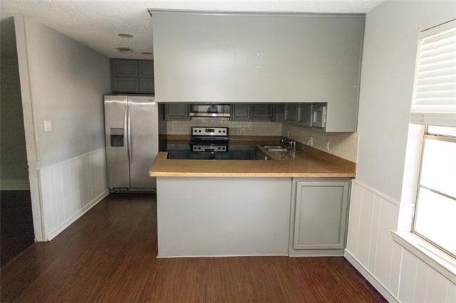 Foto del edificio - 6919 W Cleburne Rd