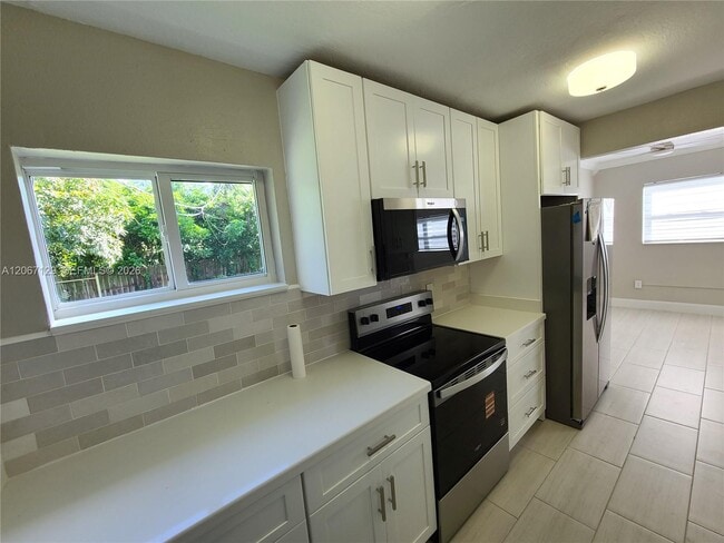 Building Photo - 1240 NE 207th Terrace