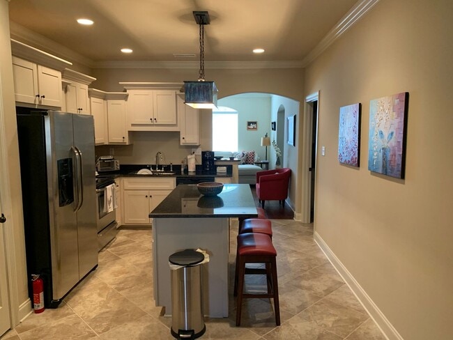 Building Photo - FULLY FURNISHED 3 bed 3.5 bath condo near pool in desirable Creekside neighborhood!