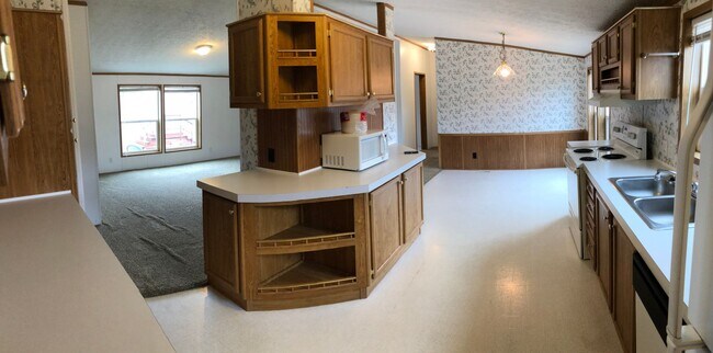 Foto del edificio - Manufactured home behind the mall