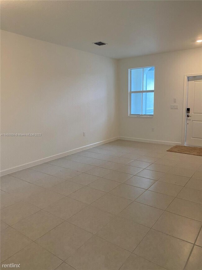 Building Photo - 3 br, 2.5 bath House - 11964 NW 47th Street 1