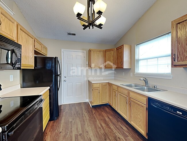 Foto del edificio - 5606 Wood Hollow Dr