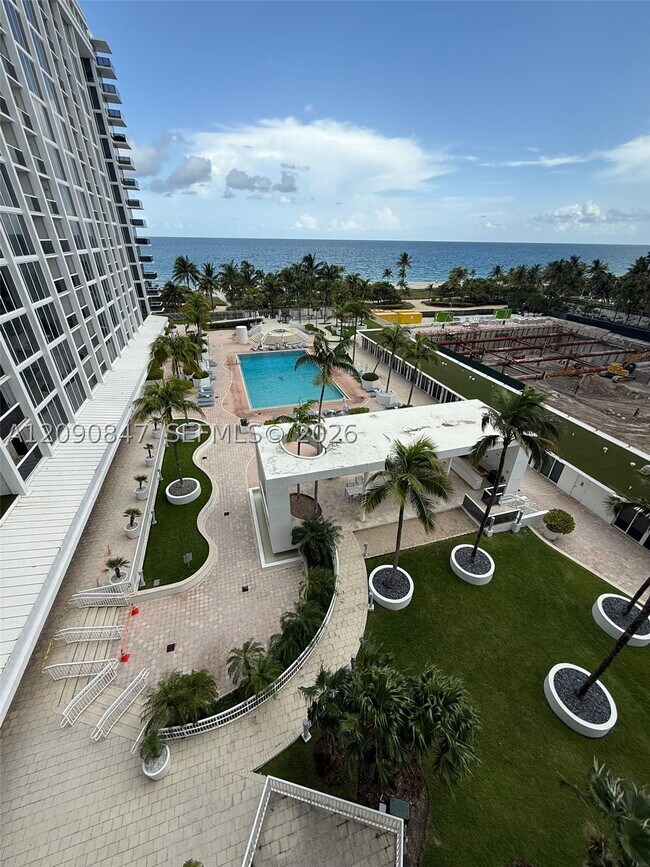 Building Photo - 10275 Collins Ave