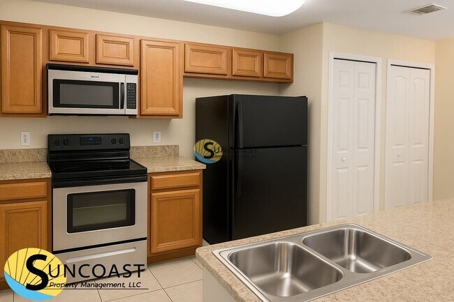 Foto del edificio - 6984 Ortega Woods Dr