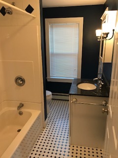 Bathroom has new plumbing, flooring, tile, and linen closet - 114 Elm St