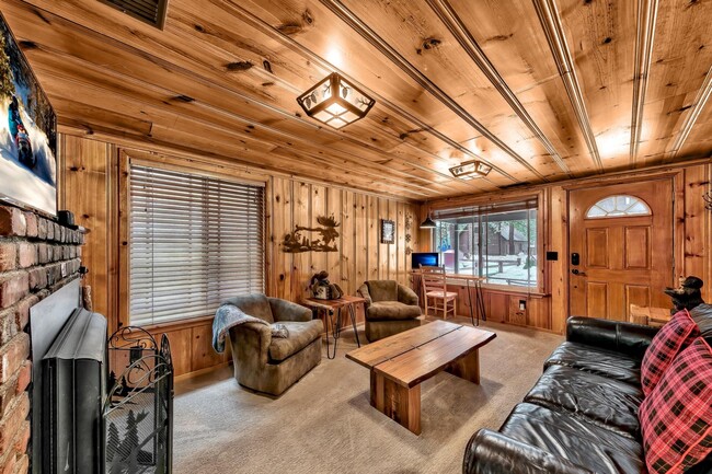 Living Room with Gas Fireplace and TV - 1139 Craig Ave