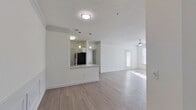 This contemporary apartment offers a seamless blend of style and functionality. The open-concept living area flows into a modern kitchen equipped with stainless steel appliances, white cabinetry, and subway tile backsplash. The bathroom boasts clean lines and updated fixtures. Large windows flood the rooms with natural light, while the private balcony provides outdoor space with a view. Bedrooms feature plush carpeting and ample closet space with wire shelving systems. The neutral color palette throughout creates a fresh, inviting atmosphere. Located in Dallas, GA, this single-story residence combines comfort and convenience in a well-designed living space.