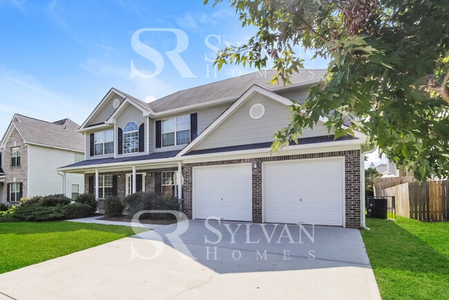 Building Photo - Lease today! No extra charge for contentme...