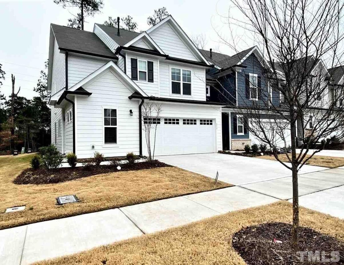 Primary Photo - 3 Bedroom 2 Garage & Sunroom End Unit