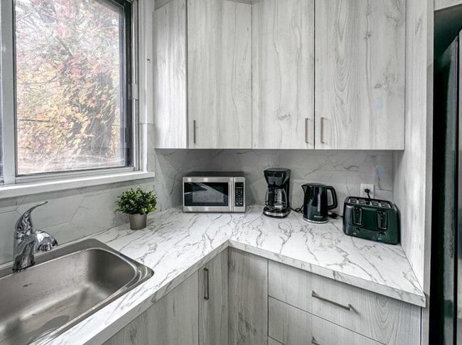 Photo du bâtiment - 720-720 Av. Marin