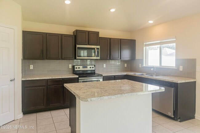 Foto del edificio - 8299 Fouraker Forest Rd