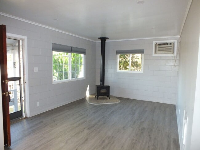 Building Photo - Placerville 2/1 with garage and small yard...