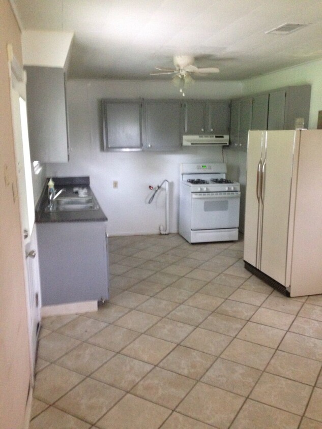 view of the kitchen from the dinning room - 98 Cedar Ln