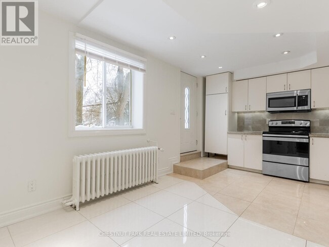 Photo du bâtiment - 121 Cheritan Ave