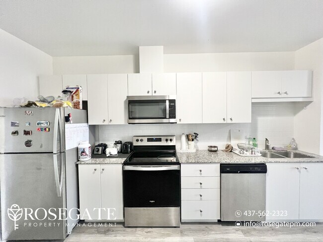 Photo du bâtiment - Modern 2-Bedroom, 1-Bath Condo – 1,000 Sq Ft