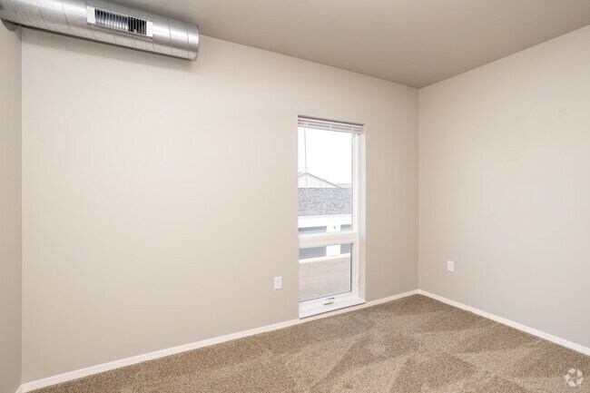 2BR, 2BA - 870SF - Secondary Bedroom - Prairie Towers - Lavish Living