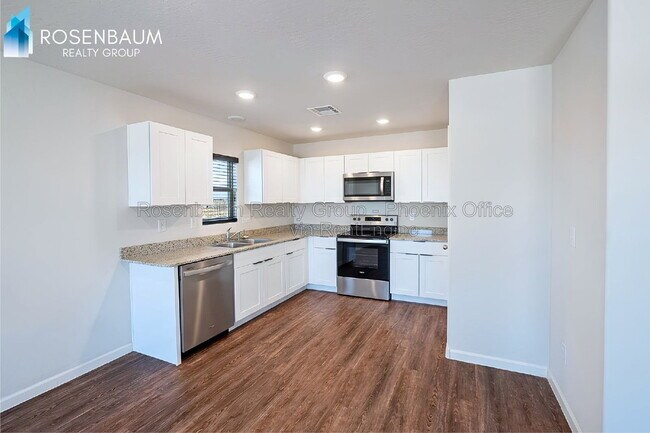 Building Photo - 11094 W Arvada Dr