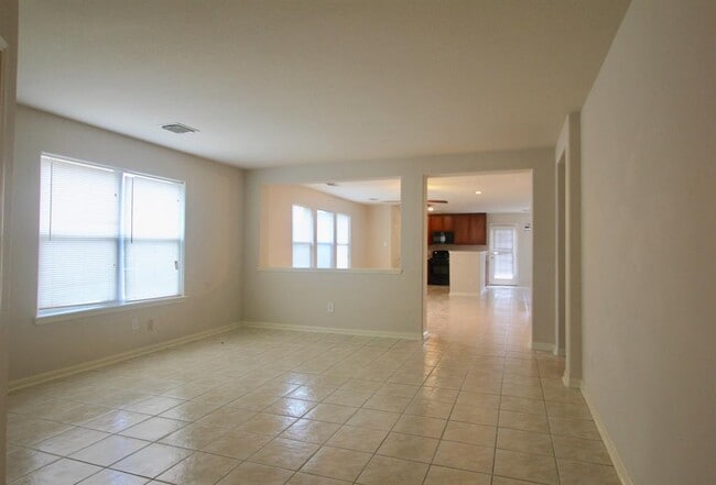 Building Photo - 9414 Coatsworth Dr