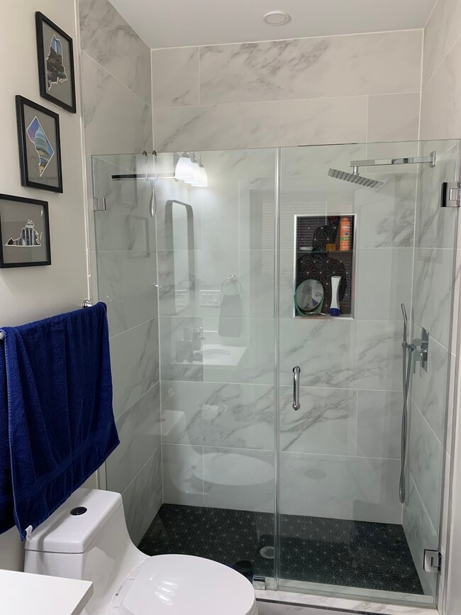 Bathroom rain shower. - 2556 University Pl NW