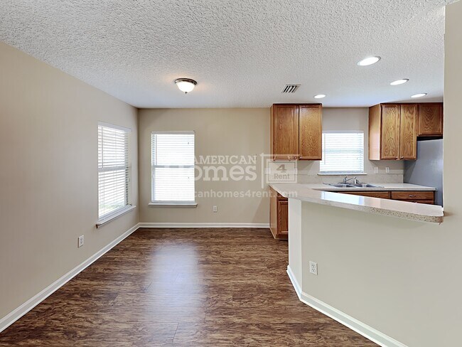 Foto del edificio - 9608 Woodstone Mill Drive