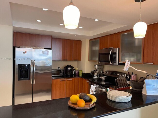 Building Photo - 16699 Collins Ave