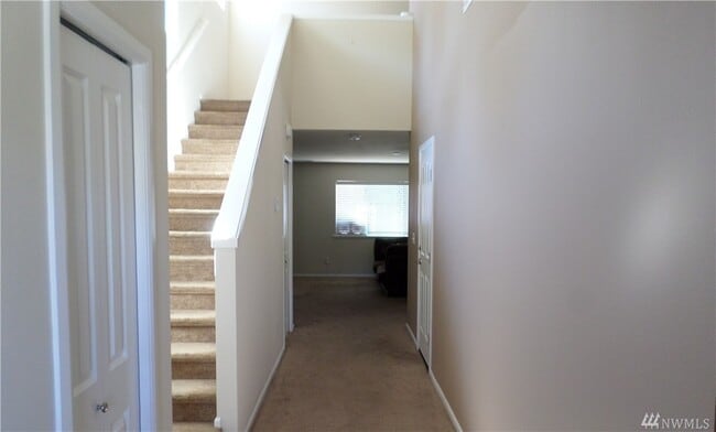 Entry Way with 1st floor bathroom and closet on the left - 6819 Sarazen St SE