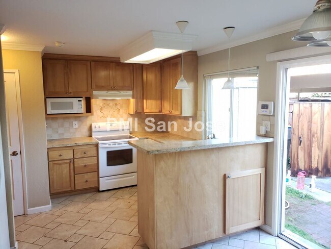 Building Photo - Blossom Valley Condo