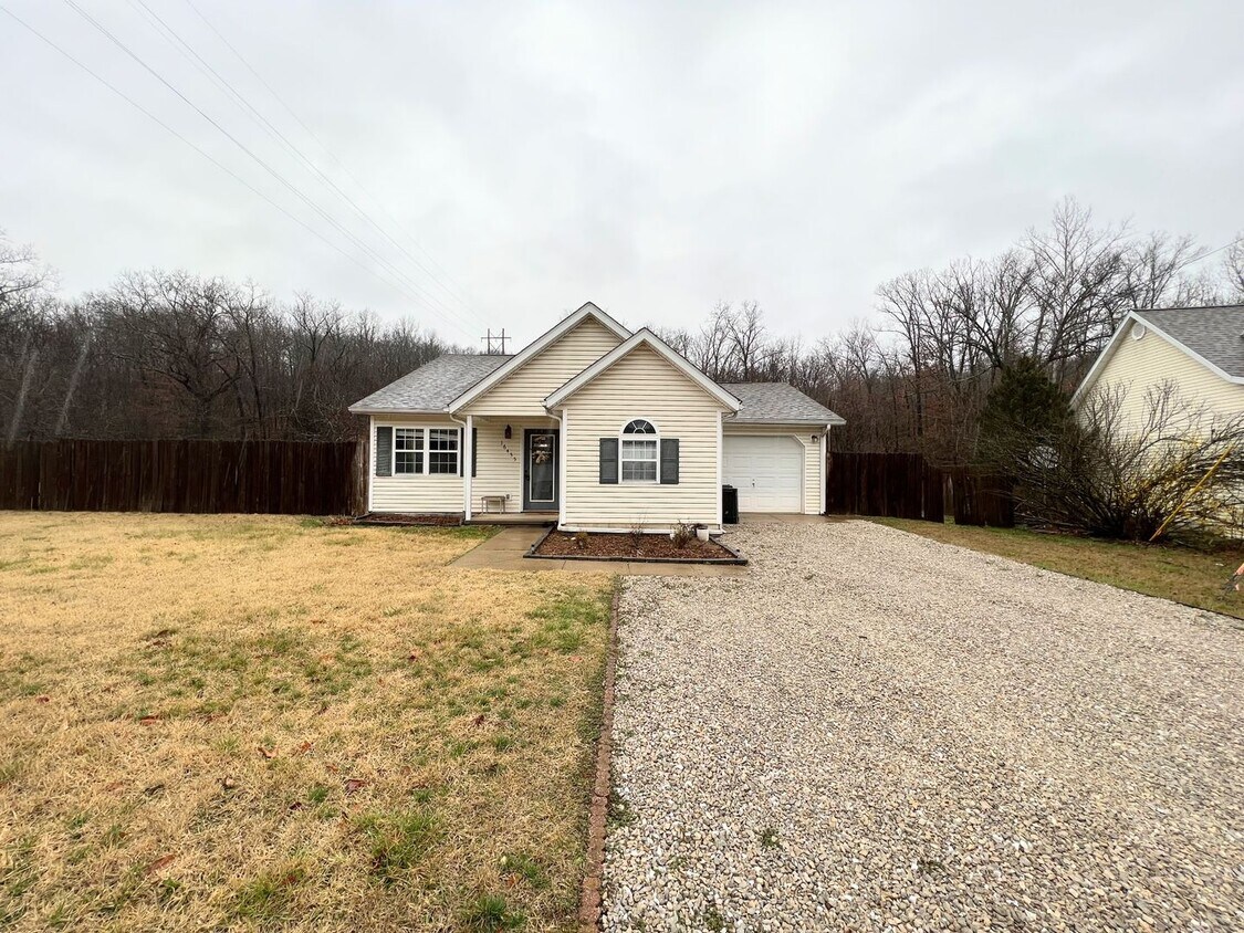 Primary Photo - Single Family Home with a fenced in backyard!