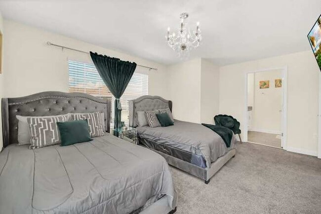 Building Photo - Unwind in Style: Heated Pool, Game Room, a...